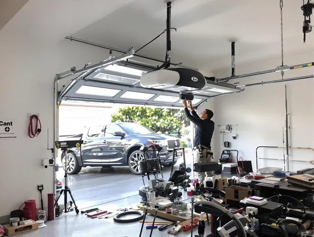 Westport Garage Door Repair specialist installing smart garage door opener system in Westport home