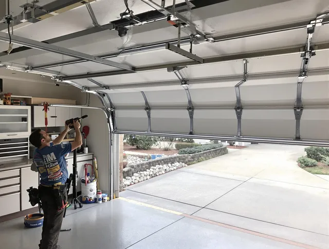 Garage door track repair service by Westport Garage Door Repair in Westport